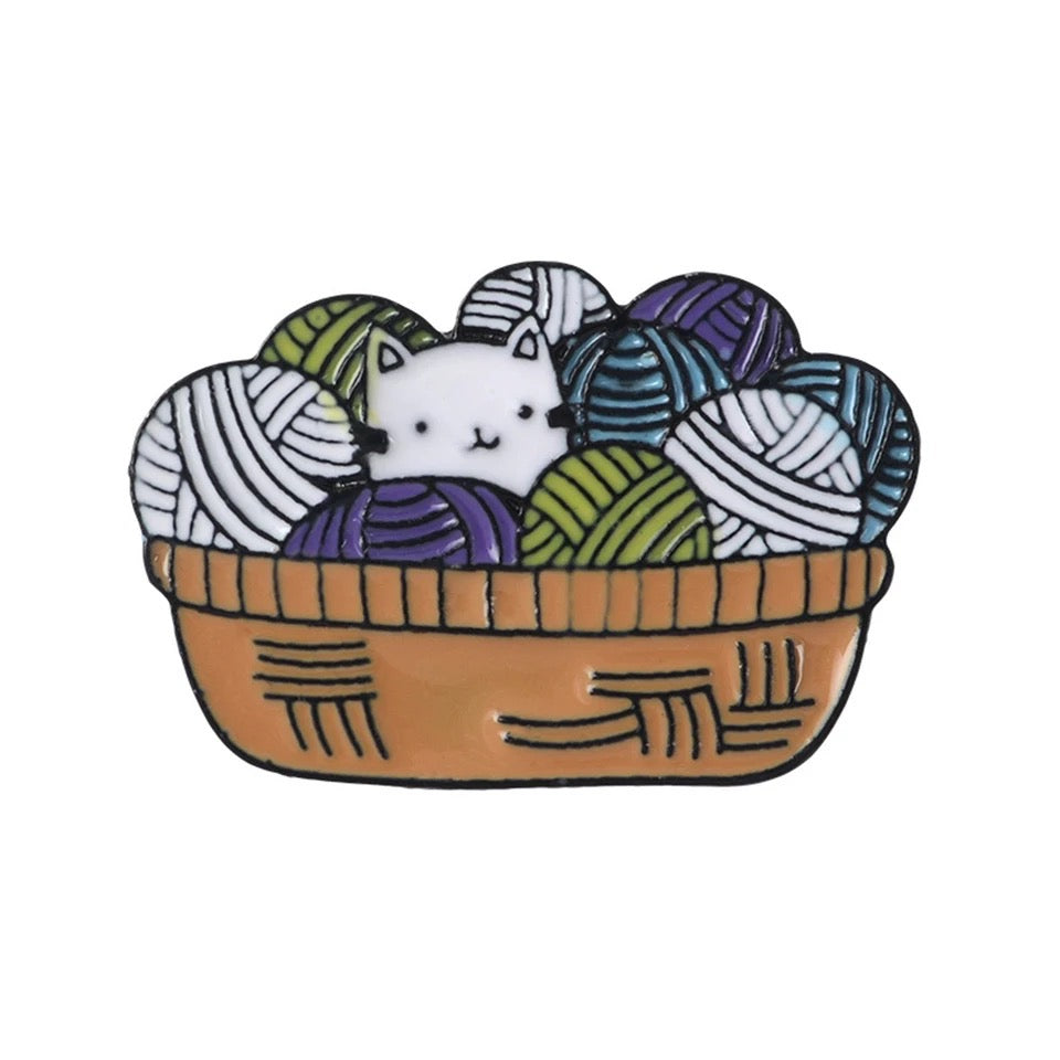Gatito y lanas